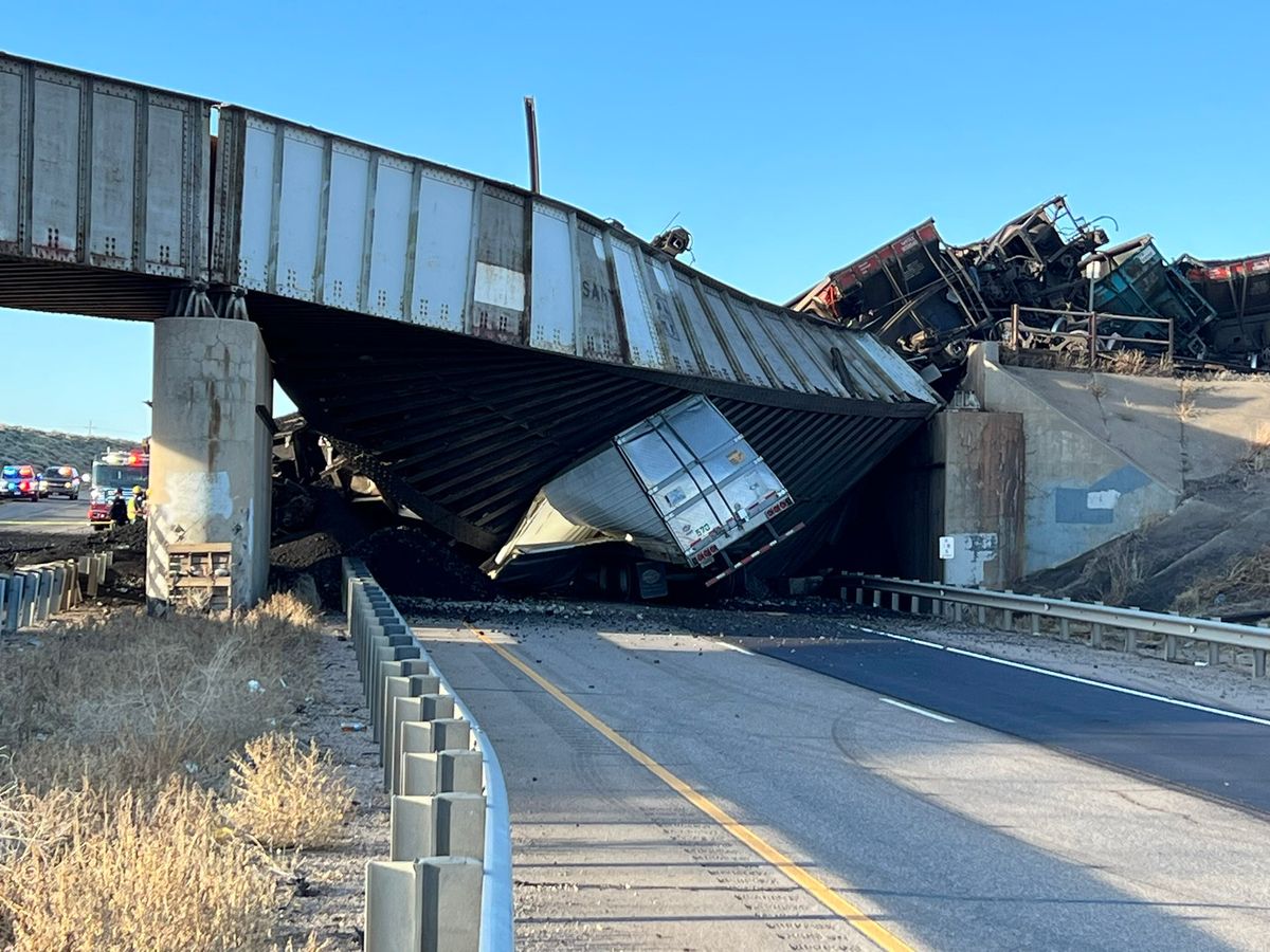 Trucker Killed Under Collapsed Bridge Following Train Derailment